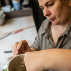 Sally Bertram at work in her studio 2019